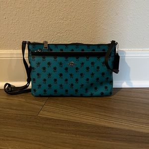 Coach Crossbody Bag. Color turquoise with mini flowers